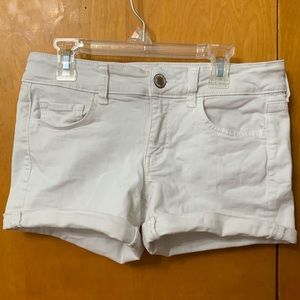 white cuffed shorts